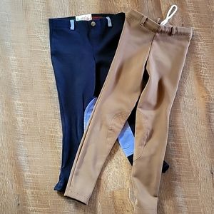 Two pairs girls riding pants